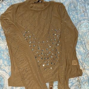 A beautiful tan bodysuit